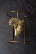 Mannequin head arm bracelet